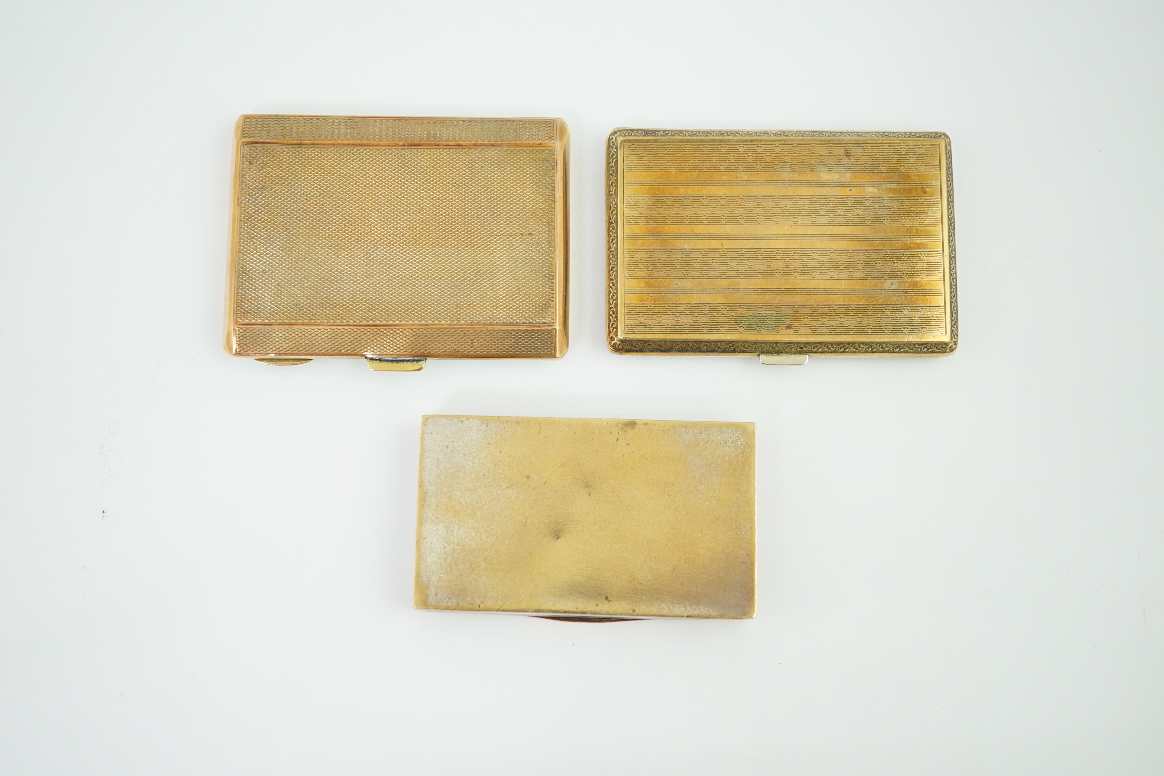 Two early 20th century enamelled white and gilt metal cigarette cases and a snuff box